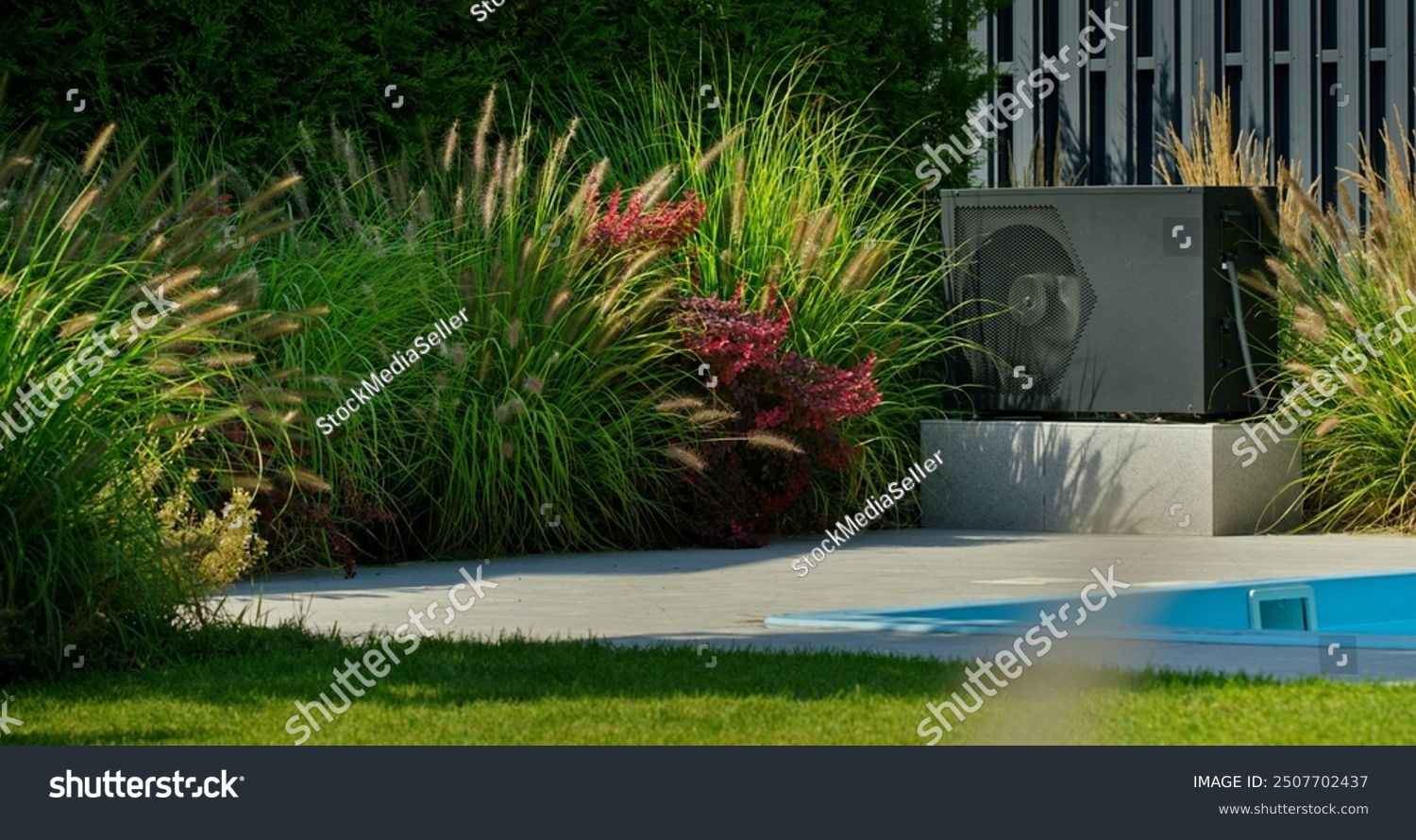 stock-photo-heat-pump-unit-near-a-backyard-pool-surrounded-by-lush-plants-and-vibrant-flowers-showcasing-2507702437
